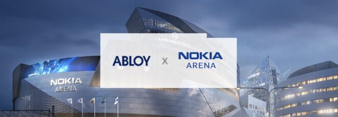 A silver structure covered by a semi-transparent box that reads ABLOY x Nokia Arena