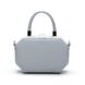 A light blue handbag set against a white background