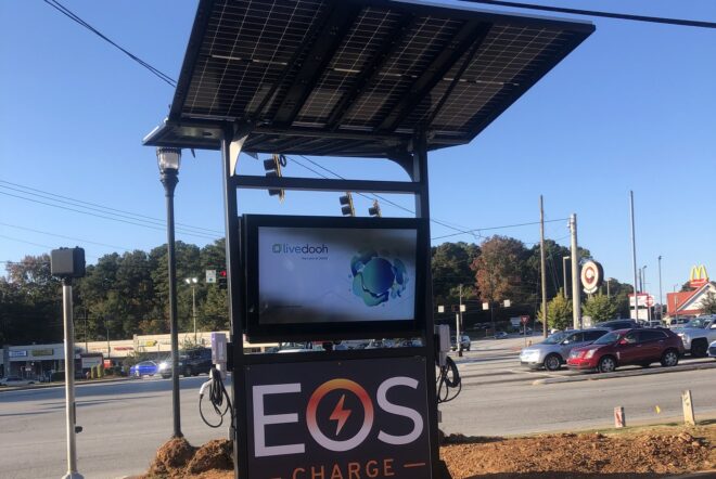 An EV charging station with a solar roof