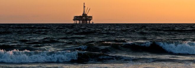 An oil rig on the coast.