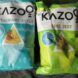 Two chip bags, one blue and one green, with the word Kazoo on them