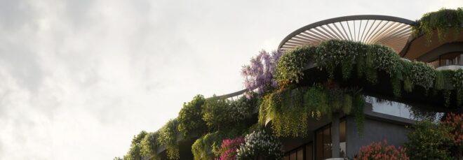 The top of a hi-rise building overflowing with green plants