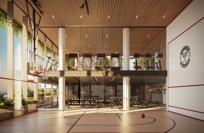 A sporting area where a basketball half-court is drawn with a seating area