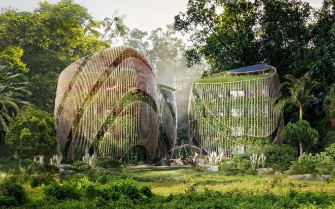 Two structures filled with greenery from top to bottom in a rainforest landscape