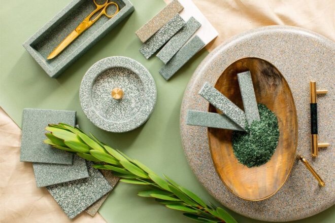 Decorative assortment of eggshell tiles and objects in shades of green