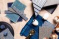 Decorative assortment of eggshell tiles and objects in blue tones