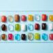 Multicolored sauce and drink packs in a edible packet