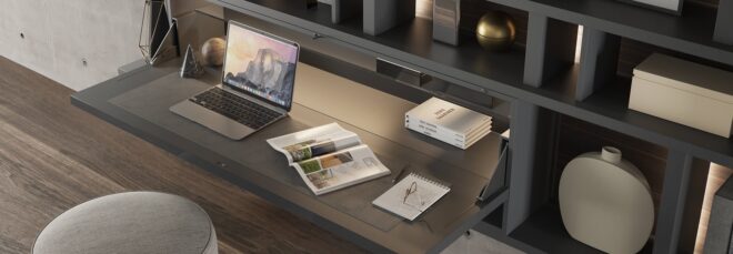 A pull down desk furniture with a laptop and books on top of the desk