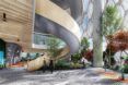An open lobby area with a curved staircase.