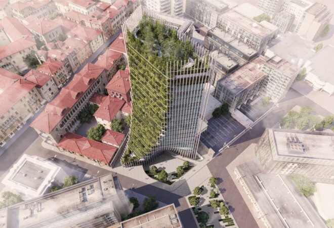 A bird's eye view of a building with greenery crawling down the building