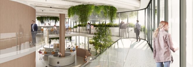 Inside the office building has white hallways and a greenery that hangs from the ceiling