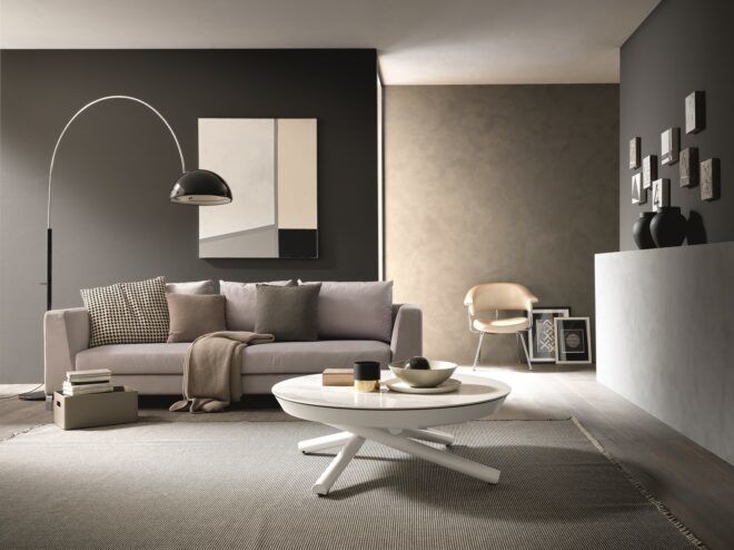 A living room area with a sofa and a coffee table