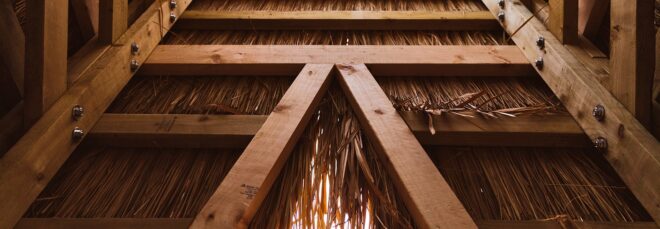 The inside details of the Feelings Library is made out of wood and a hay material