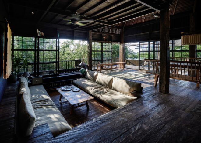 A living room area has sofas that are facing each other with a coffee table in the center of the two sofas