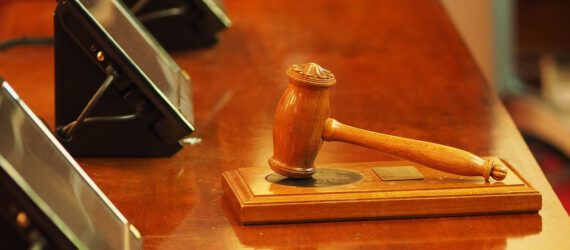A gavel on a bench.