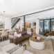 A living room that is connected to a dining area