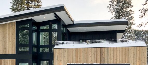 The outside of a prefab home in a snowy area