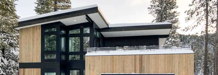The outside of a prefab home in a snowy area