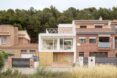 A row of brick homes.