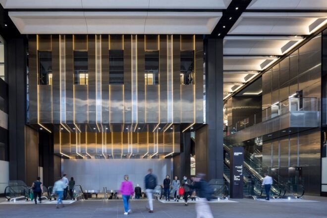 The outside of the building has a pathway for pedestrians to walk on