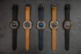 Cactus leather wristwatches laid side-by-side in black, brown and blue.