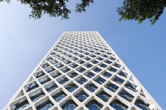 The exterior of a building with a crisscross exterior.