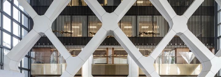 The exterior of a building with a crisscross exterior.