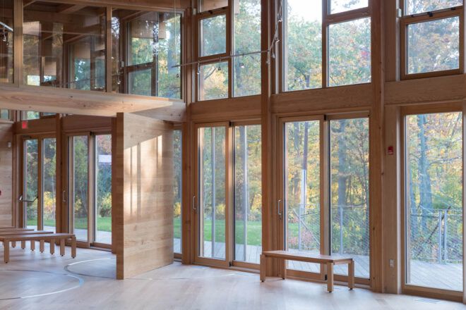 Large windows framed by wood.