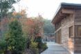 A walkway by a wooden building.