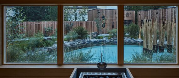 A window that overlooks a pool