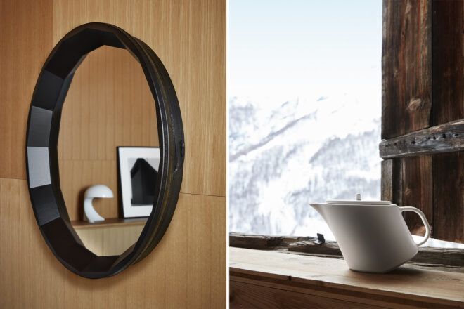 Left, an oval mirror with black frame. Right, a white teapot by a window.