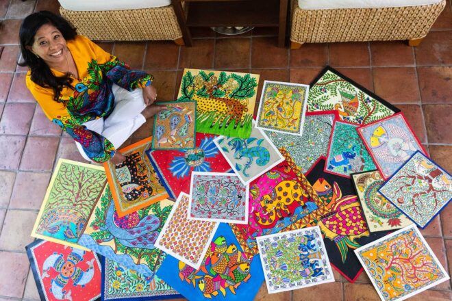 A spread of colorful painted designs.
