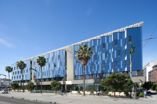 A large blue apartment building