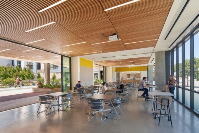 An interior dining hall with wooden ceiling