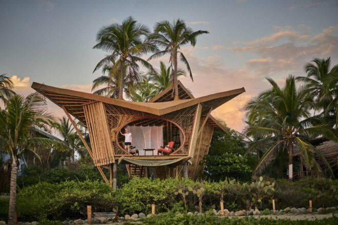 A bamboo structure on the beach.