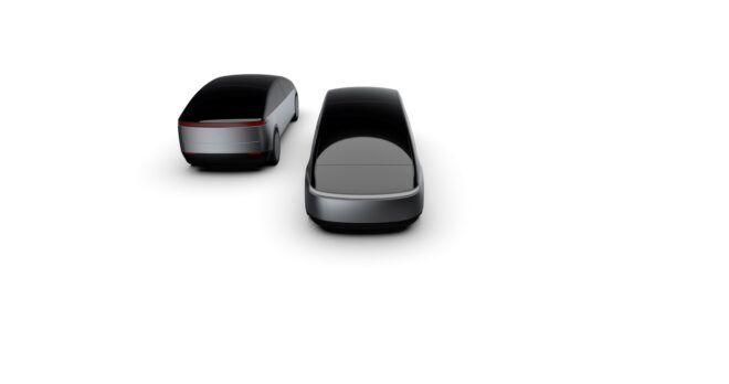 The back of two black cars against a white background