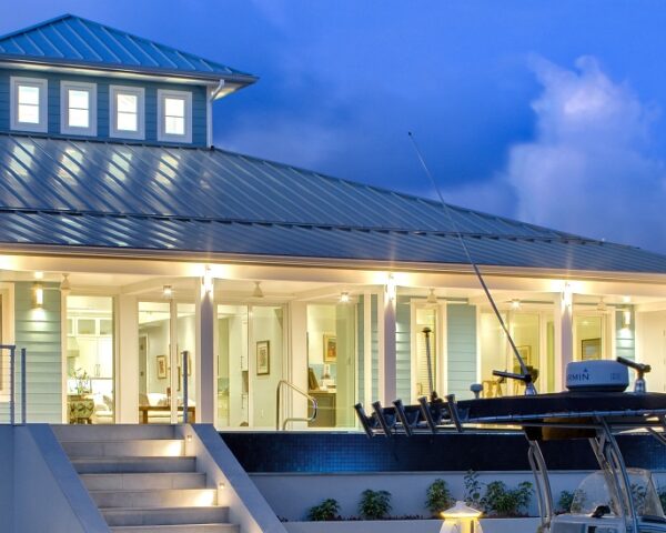 A house that is lit up during evening time