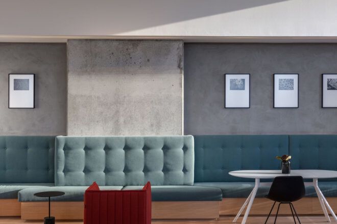 A living area with blue couch.