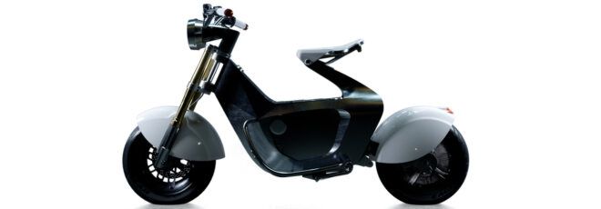 A metal scooter against a white background.