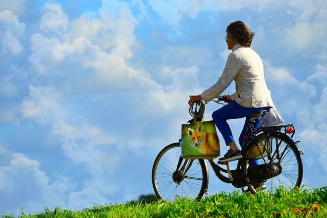 A person on a bike.