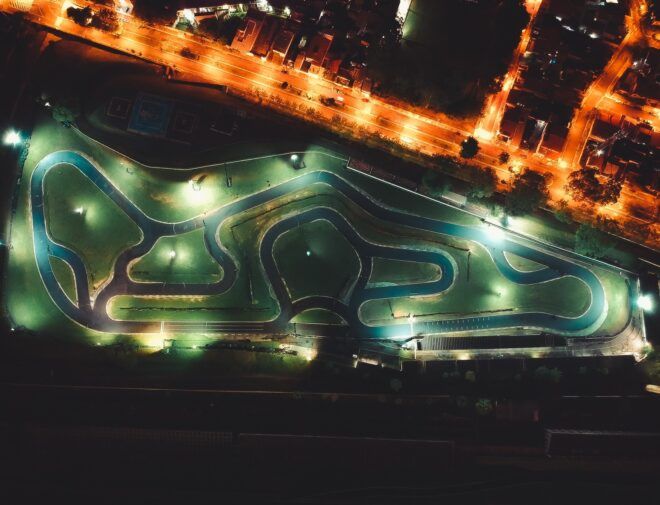 A race car track lit up at night