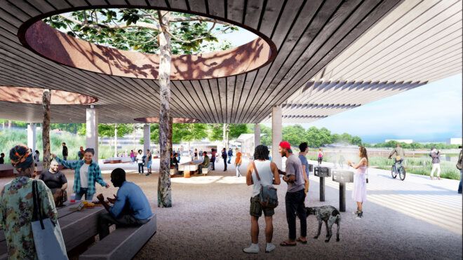 A pavilion area where a grows in the center and bursts through a circle roof cutout