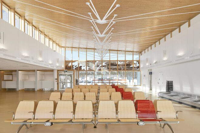 An airport terminal with wood features.
