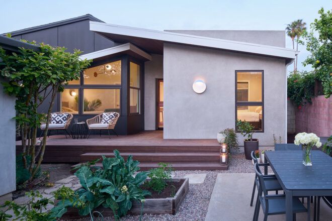 A home exterior showing a backyard garden.