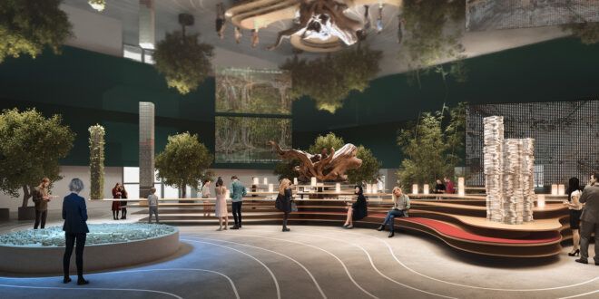 An auditorium area with people leaning against display cases