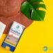 A reef-safe sunscreen against a yellow background.