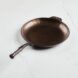 The cast iron tilted off diagonally