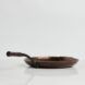 The side of the cast iron pan