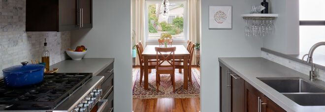 A kitchen with a doorway to the dining room in the middle.