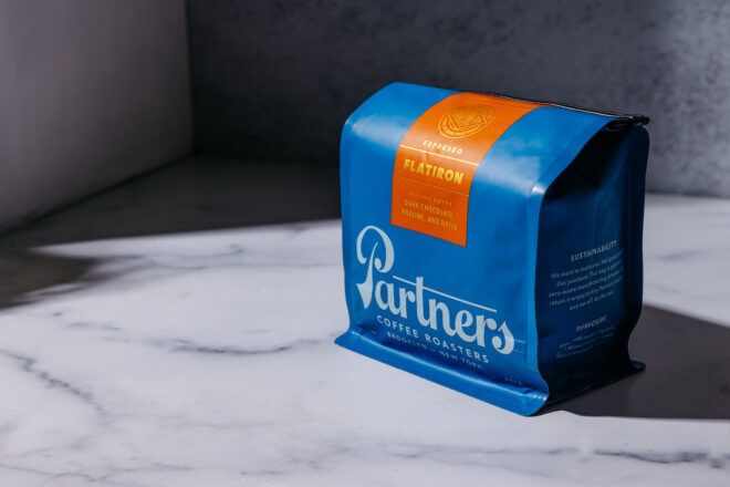A blue Partners Coffee box